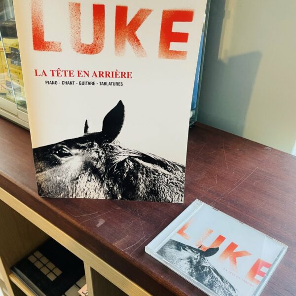 Livre Luke la tête en arrière, CD, édition ID Music
