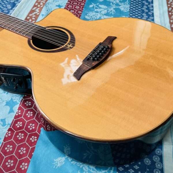Alternative view of Guitare électro-acoustique 12 cordes Lâg T400 J12CE n°1206WE114692