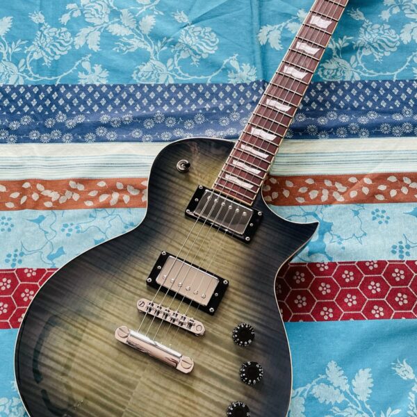 Guitare électrique LTD EC-256 blue flame transparent n°IS21042660 (Indonésia), mécaniques Grover, sillet changé