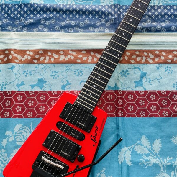 Guitare électrique Steinberger Spirit Gt-Pro deluxe HR red n°22062353112, housse d’origine, sangle Dunlop, 2 jeux cordes