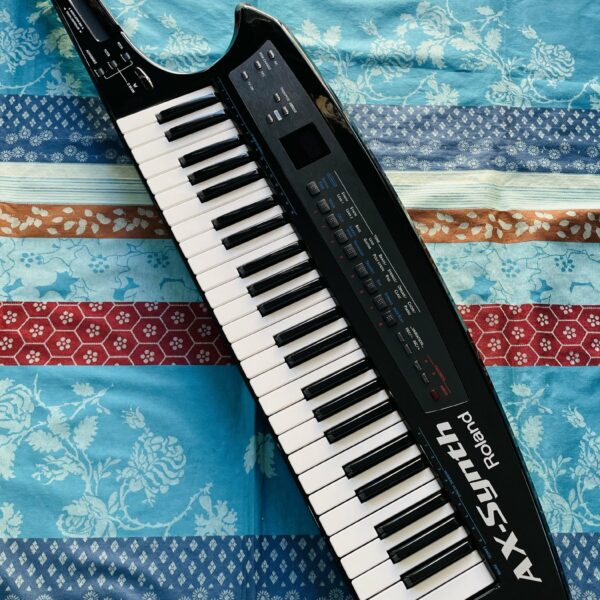 Clavier synthé portable Roland AX-Synth n°Z1D4407, sangle Roland, alim